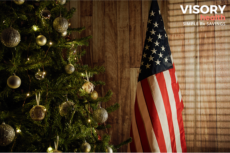 American Flag next to Christmas Tree - Visory Health Blog
